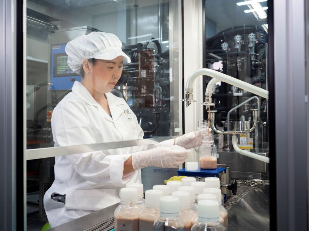 Cecilia Ng, Manager of the Dairy and Frozen Desserts department bottling trial samples of milk in NIC’s dairy and frozen desserts lab